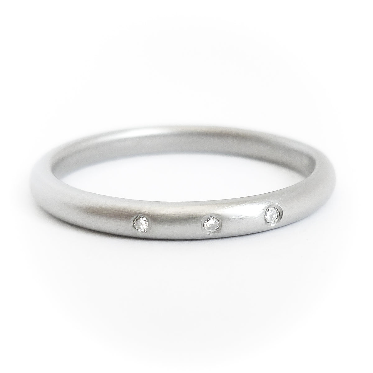 Simple elegant contemporary modern platinum and diamond wedding ring handmade by Sue LaneSimple elegant contemporary modern platinum and diamond wedding ring handmade by Sue Lane