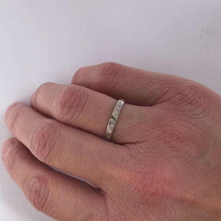 Contemporary platinum and diamond engagement ring handmade bespoke by Sue Lane