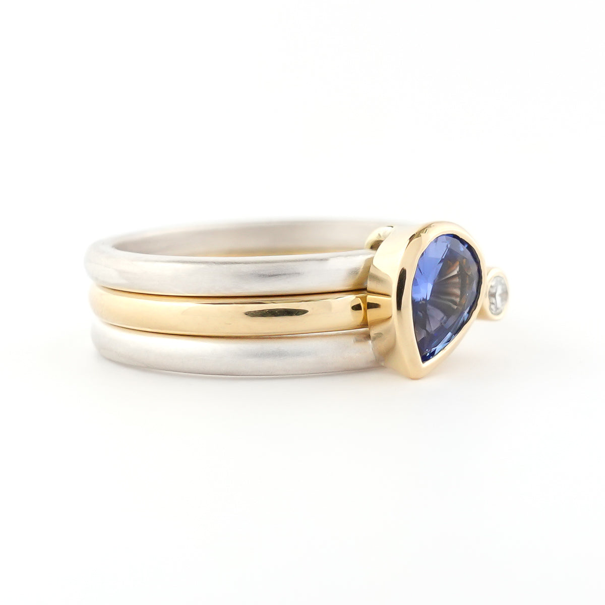 A contemporary bespoke unique aquamarine and diamond gold and silver ring by Sue Lane