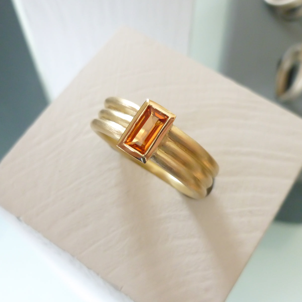 Contemporary 18ct gold ring with orange sapphire - handmade, designer, bespoke, custom Sue Lane.