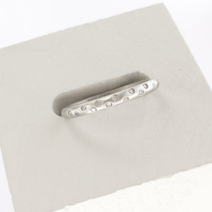 Contemporary, unique, bespoke and modern platinum diamond wedding ring, engagement ring, eternity ring, matt brushed finish. Handmade by designer maker Sue Lane