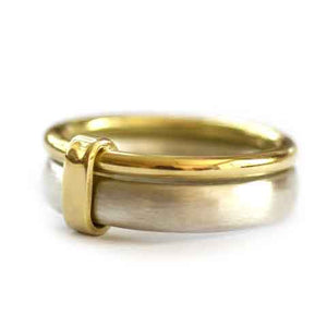 Unusual, unique, bespoke and modern three band stacking ring in silver and gold. Handmade by Sue Lane Jewellery in Herefordshire, UK. Unique wedding ring.
