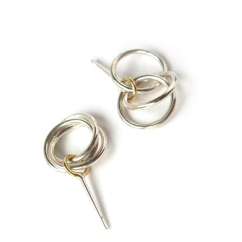 Contemporary, bespoke and modern silver and gold stud earrings with a matt brushed finish. Handmade by Sue Lane in Herefordshire, UK