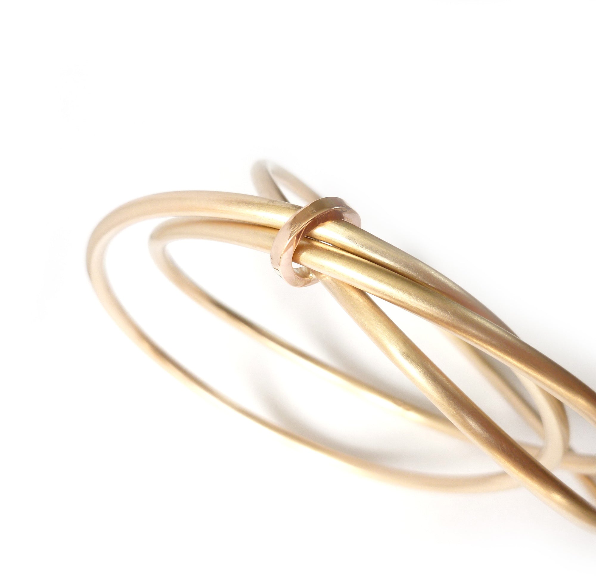 Unusual, unique, bespoke and modern gold Russian style bangle with brushed finish. Handmade by Sue Lane Contempoary Jewellery in Herefordshire, UK