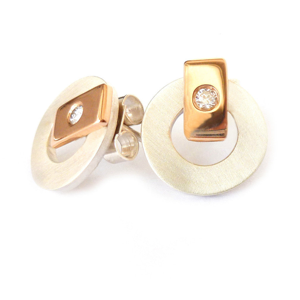Contemporary and modern earrings in silver and 18k rose gold with a flush set diamond handmade by UK designer maker Sue Lane jewellery