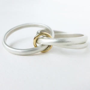 Unusual, unique, bespoke and modern silver "Russian Wedding ring" playful and tactile with brushed finish. Handmade by Sue Lane Contemporary Jewellery UK. 