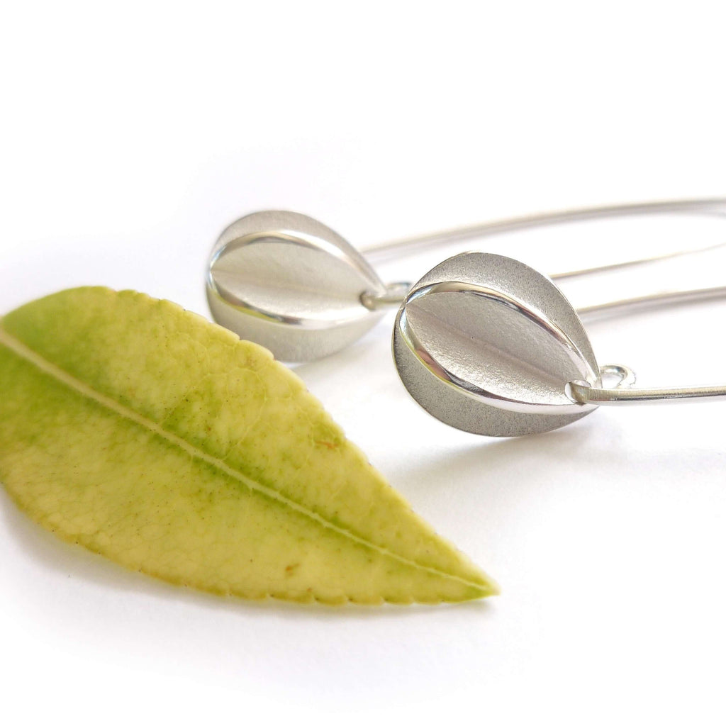 Simple, contemporary, modern and unique silver hook earrings