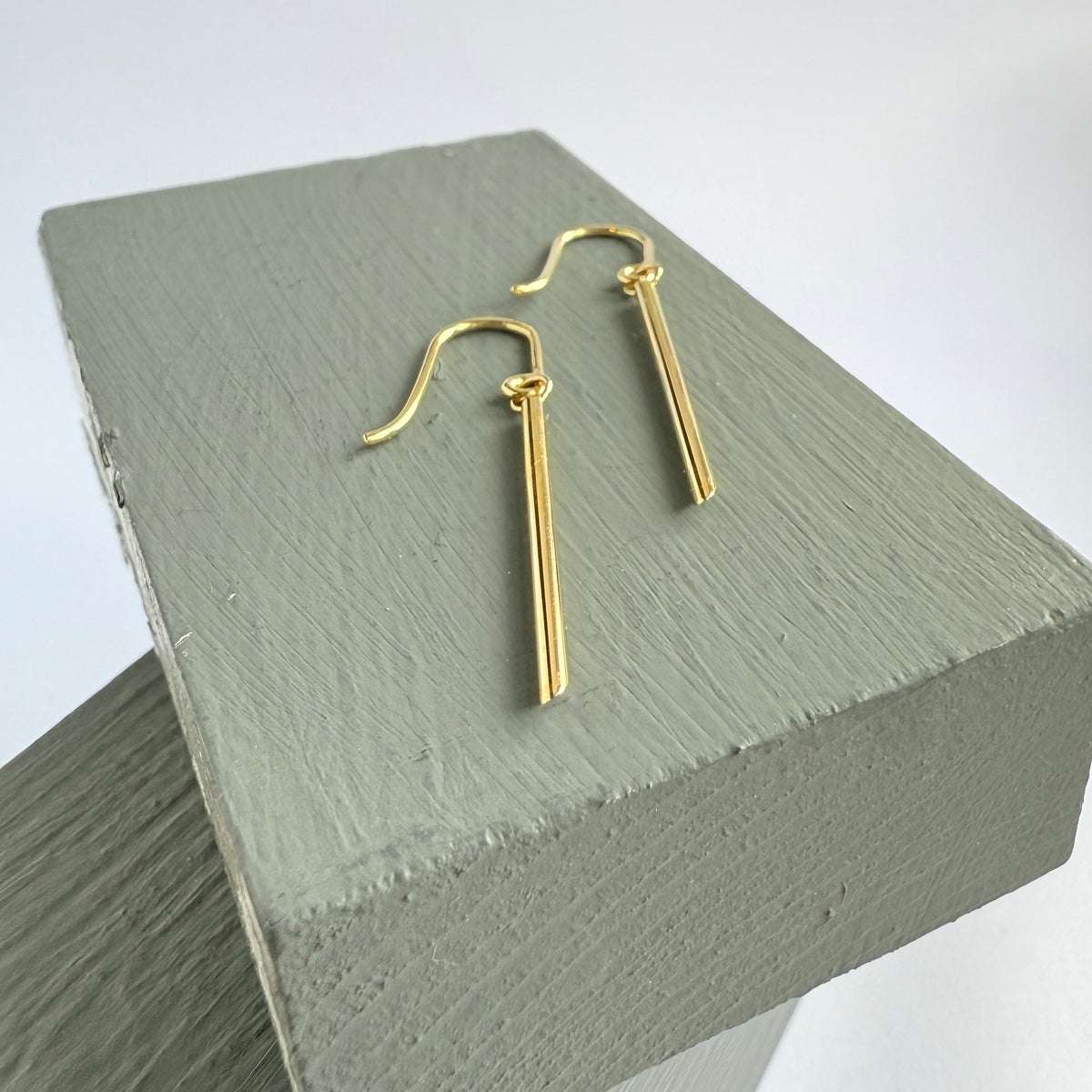 18ct yellow gold simple drophook earrings with a modern contemporary design by Sue Lane Jewellery