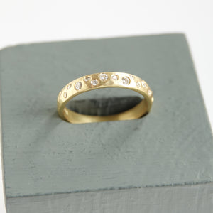 18ct gold diamond eternity ring with a hammered textured Sue Lane contemporary bespoke handmade
