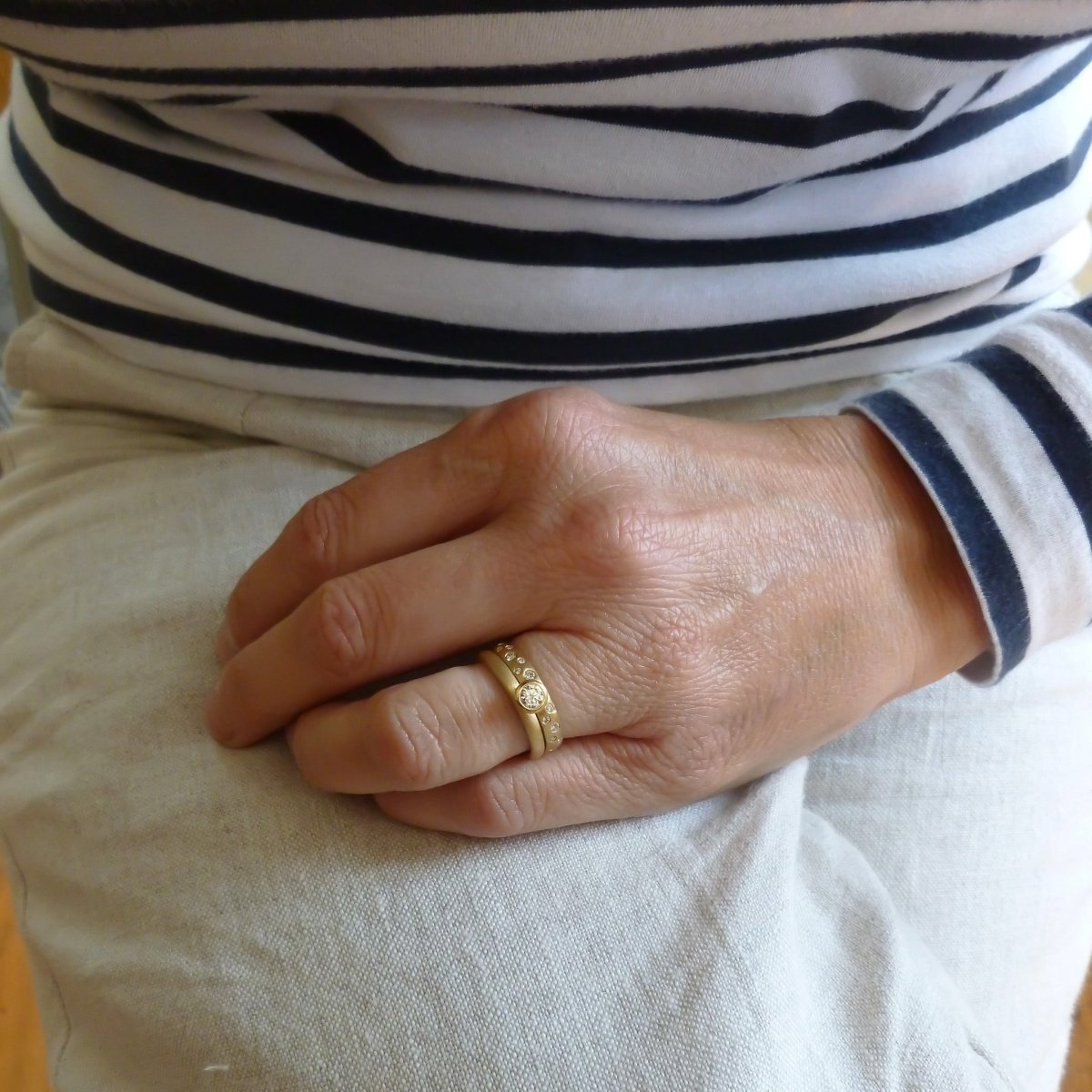 18ct gold diamond eternity ring with a hammered textured Sue Lane contemporary bespoke handmade
