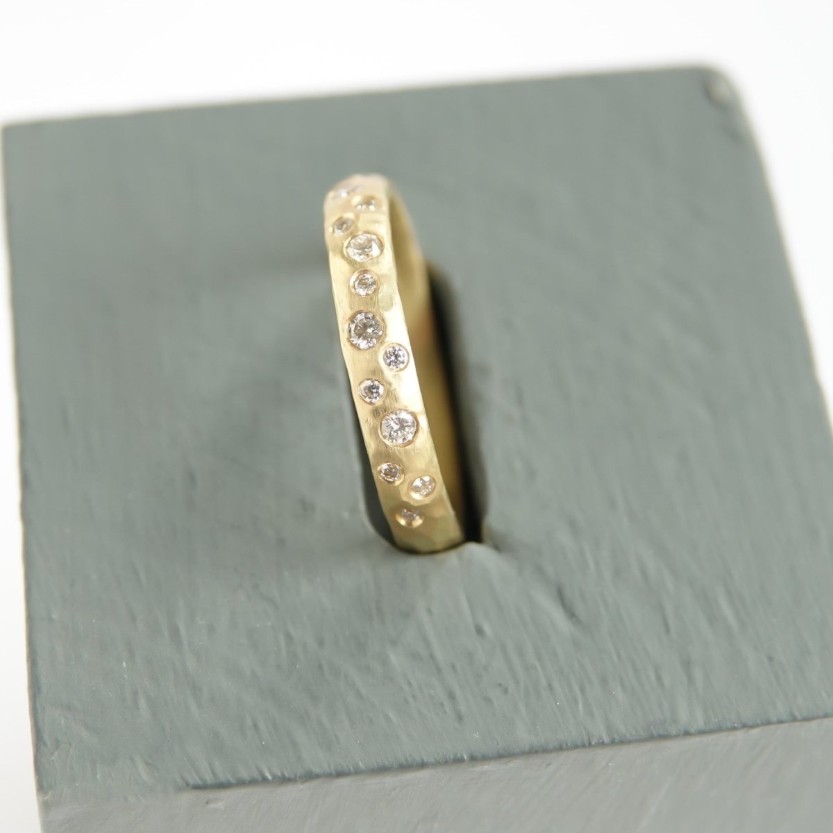 18ct gold diamond eternity ring with a hammered textured Sue Lane contemporary bespoke handmade