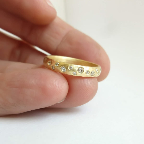 18ct gold diamond eternity ring with a hammered textured Sue Lane contemporary bespoke handmade