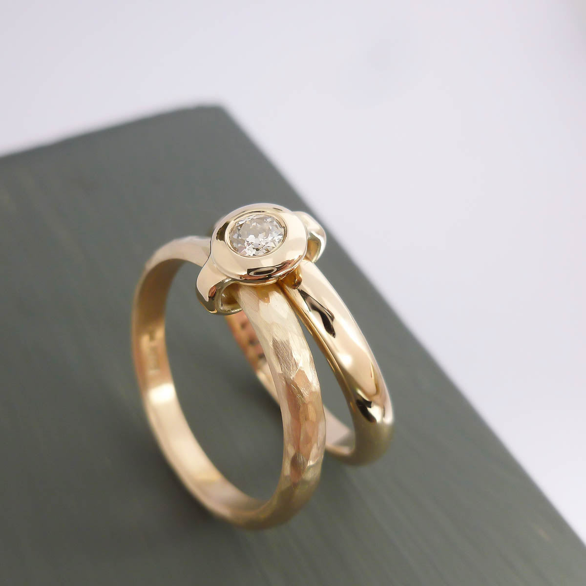 Contemporary 9ct yellow gold double band linked ring with diamond, handmade by Sue Lane Jewellery in Herefordshire, UK.