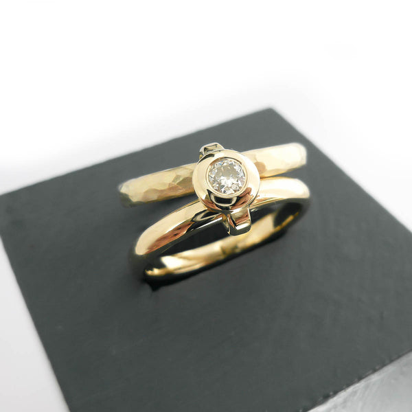 Contemporary 9ct yellow gold double band linked ring with diamond, handmade by Sue Lane Jewellery in Herefordshire, UK.