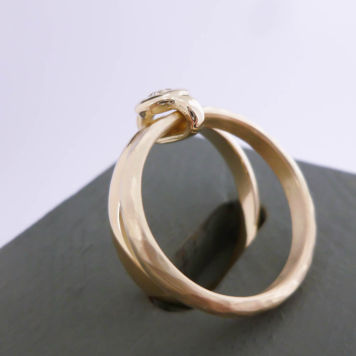 Contemporary 9ct yellow gold double band linked ring with diamond, handmade by Sue Lane Jewellery in Herefordshire, UK.