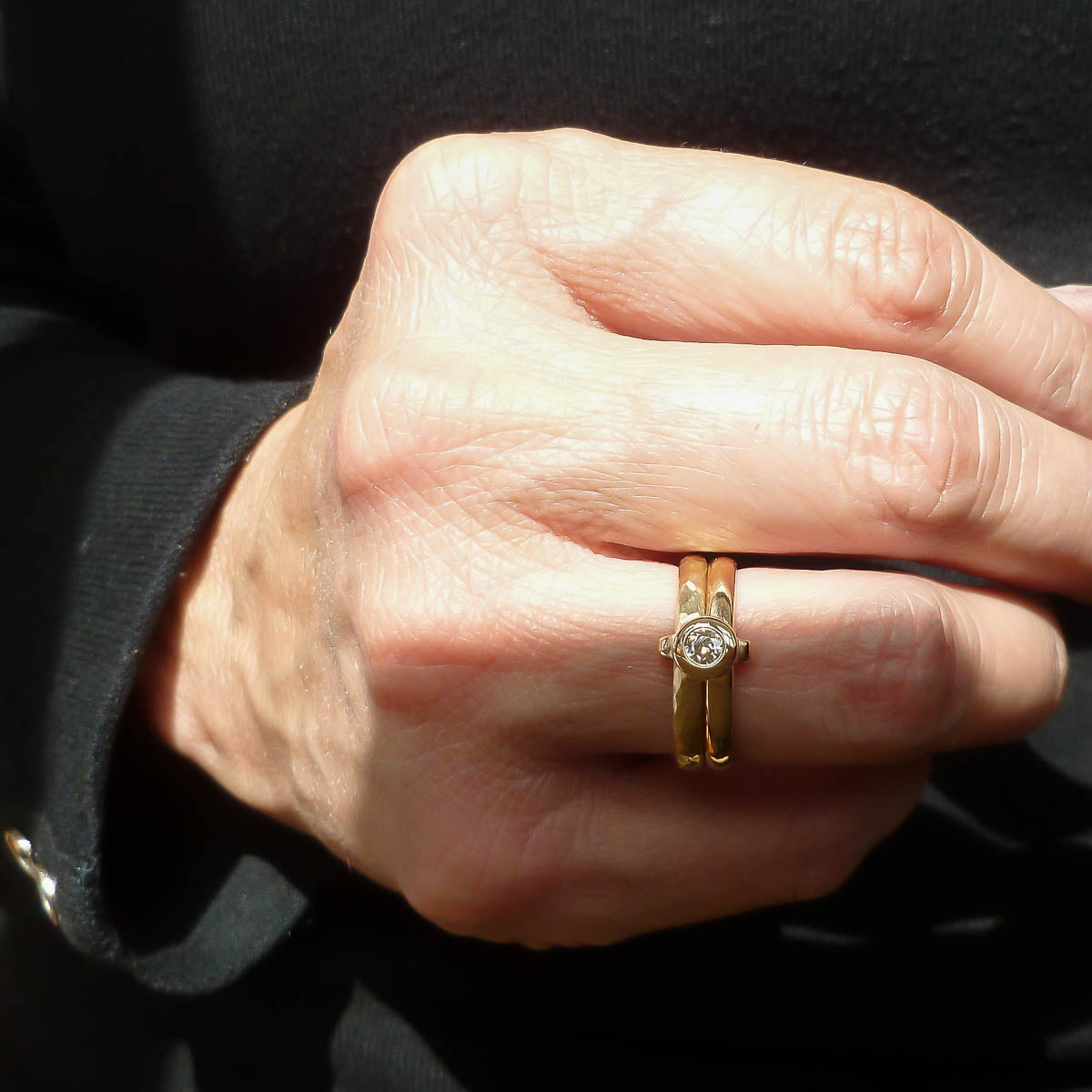Contemporary 9ct yellow gold double band linked ring with diamond, handmade by Sue Lane Jewellery in Herefordshire, UK.