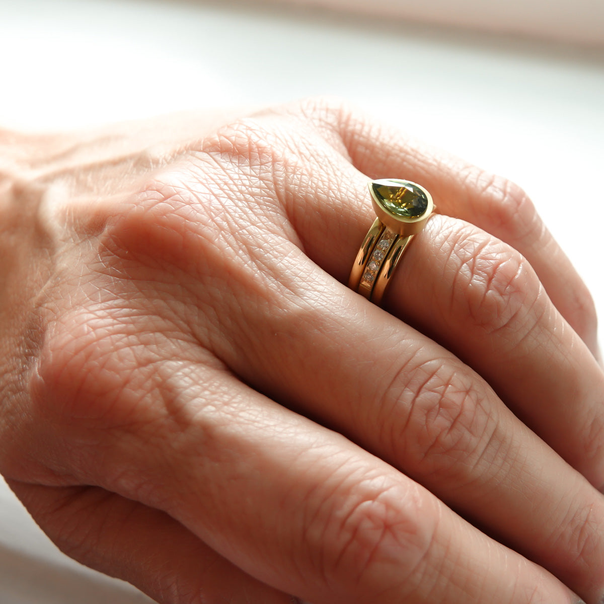 Bespoke 18ct gold ring made to order with choice of sapphires and bands