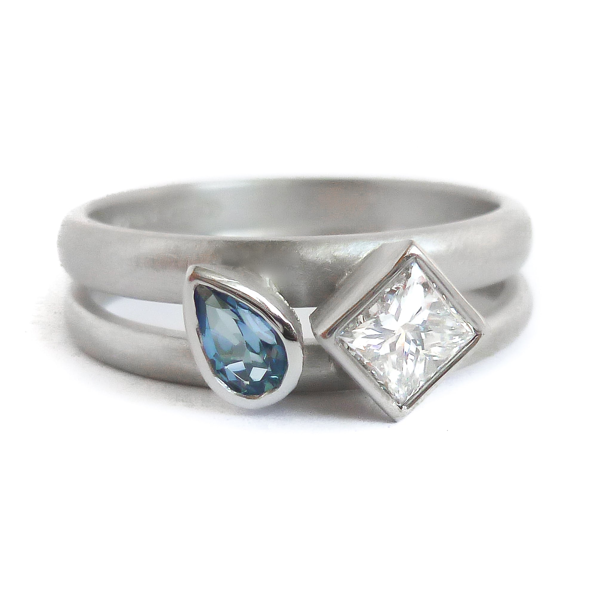 Contemporary diamond and aquamarine platinum dress ring handmade by Sue Lane