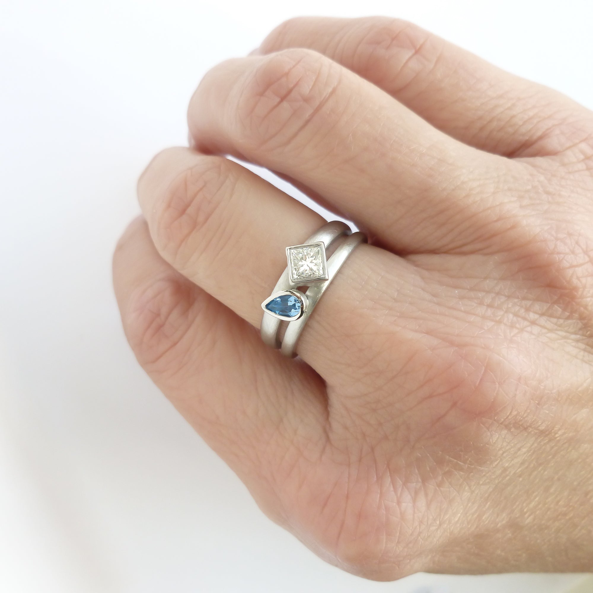 Contemporary diamond and aquamarine platinum dress ring handmade by Sue Lane
