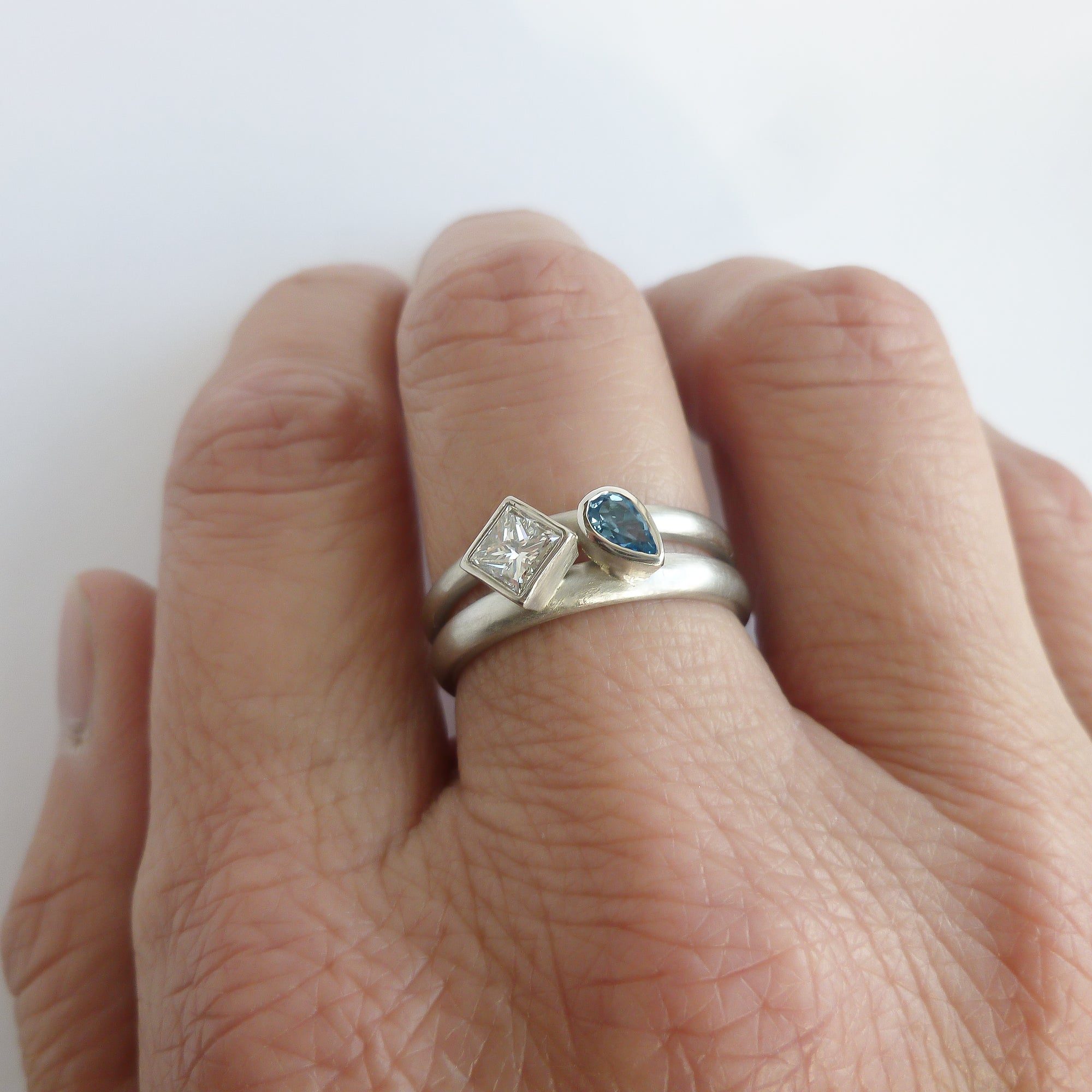 Contemporary diamond and aquamarine platinum dress ring handmade by Sue LaneContemporary diamond and aquamarine platinum dress ring handmade by Sue Lane