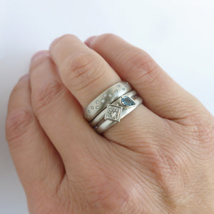 Contemporary diamond and aquamarine platinum dress ring handmade by Sue Lane