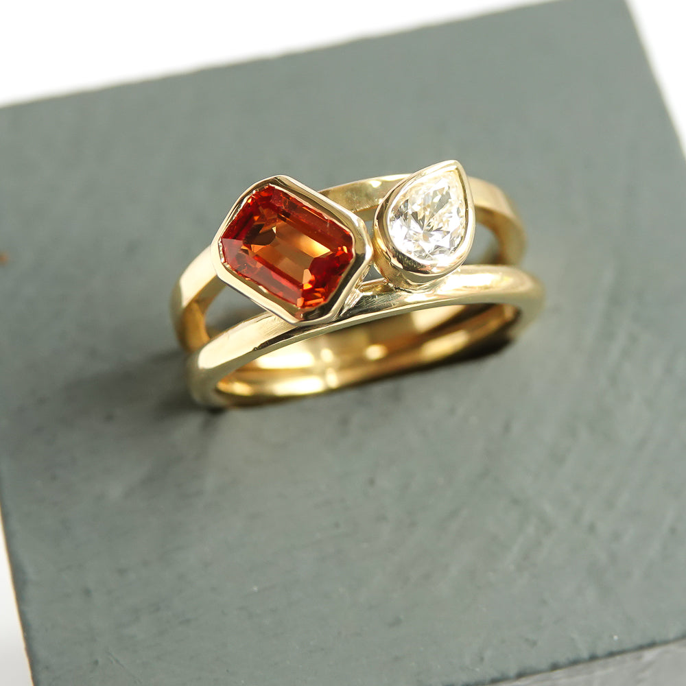 unique, bespoke, ethically sourced and conflict free orange sapphire and pear shaped diamond 18ct ring. Contemporary, bespoke, modern. It would be a fabulous alternative engagement ring or eternity ring.