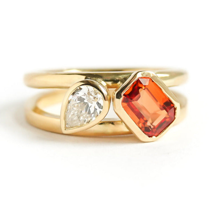 unique, bespoke, ethically sourced and conflict free orange sapphire and pear shaped diamond 18ct ring. Contemporary, bespoke, modern. It would be a fabulous alternative engagement ring or eternity ring.