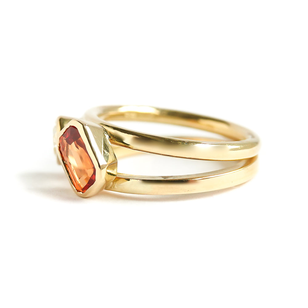 unique, bespoke, ethically sourced and conflict free orange sapphire and pear shaped diamond 18ct ring. Contemporary, bespoke, modern. It would be a fabulous alternative engagement ring or eternity ring.