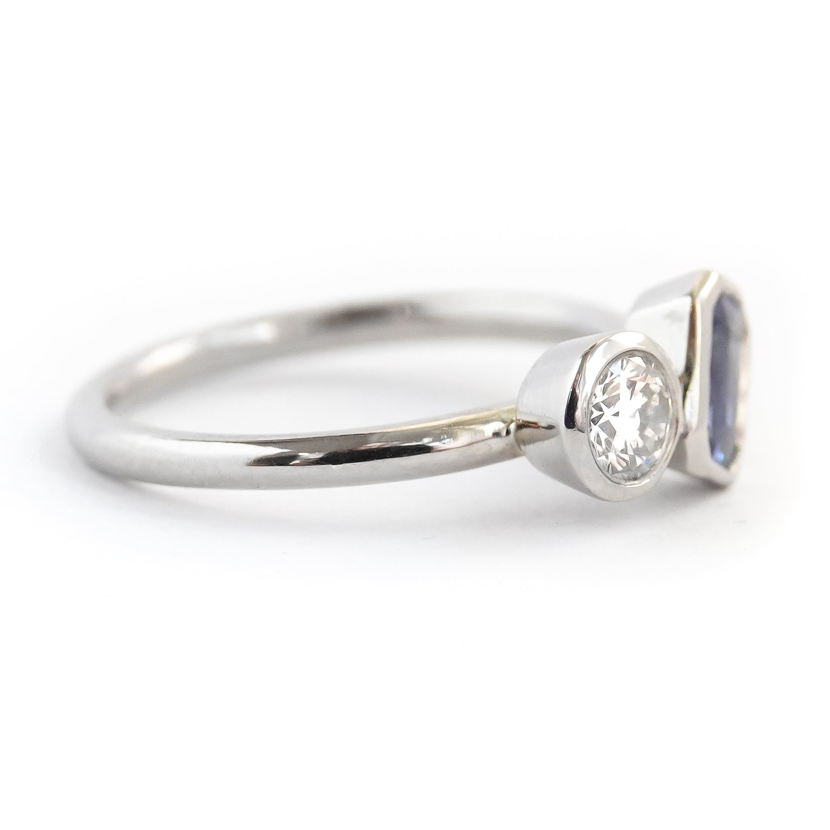 Contemporary platinum blue sapphire and diamond stacking engagement ring toi et moi