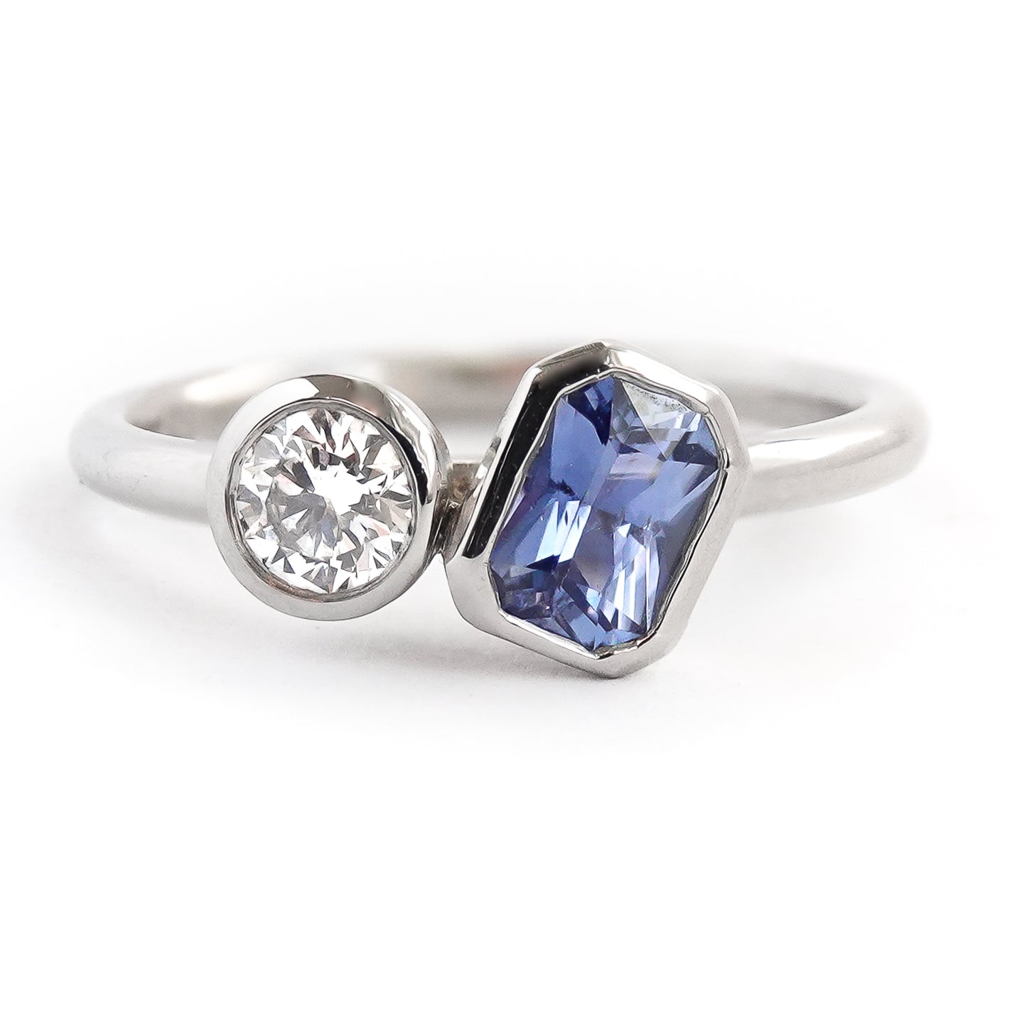 Contemporary platinum blue sapphire and diamond stacking engagement ring toi et moi