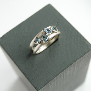 Contemporary silver and 18ct gold two band aquamarine ring by Sue Lane