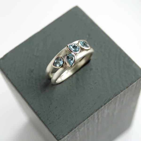 Contemporary silver and 18ct gold two band aquamarine ring by Sue Lane