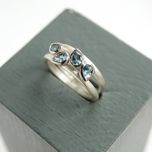 Contemporary silver and 18ct gold two band aquamarine ring by Sue Lane