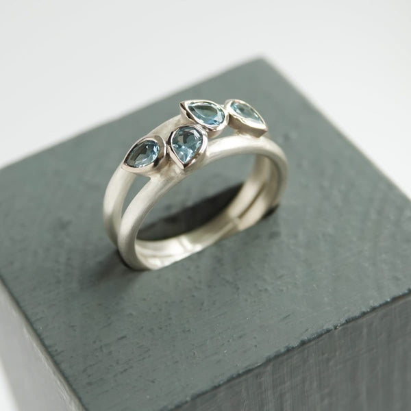 Contemporary silver and 18ct gold two band aquamarine ring by Sue Lane