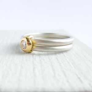 Contemporary modern yellow gold, silver diamond engagement ring, dress ring, eternity ring. Multi band ring or interlocking ring, sometimes called double band ring too.