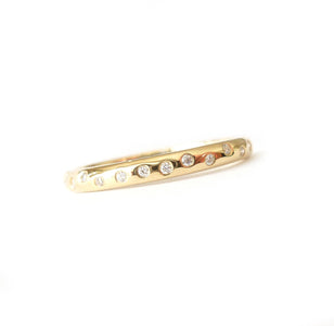 Contemporary and unique handmade gold 10 diamond modern eternity ring, bespoke wedding ring, or engagement ring by Sue Lane Contemporary Jewellery, UK.