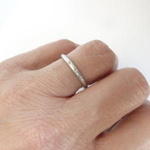 Simple elegant contemporary modern platinum and diamond wedding ring handmade by Sue Lane