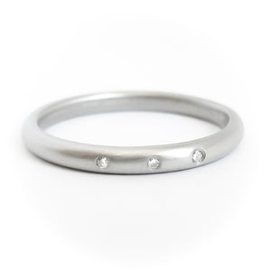 Simple elegant contemporary modern platinum and diamond wedding ring handmade by Sue LaneSimple elegant contemporary modern platinum and diamond wedding ring handmade by Sue Lane