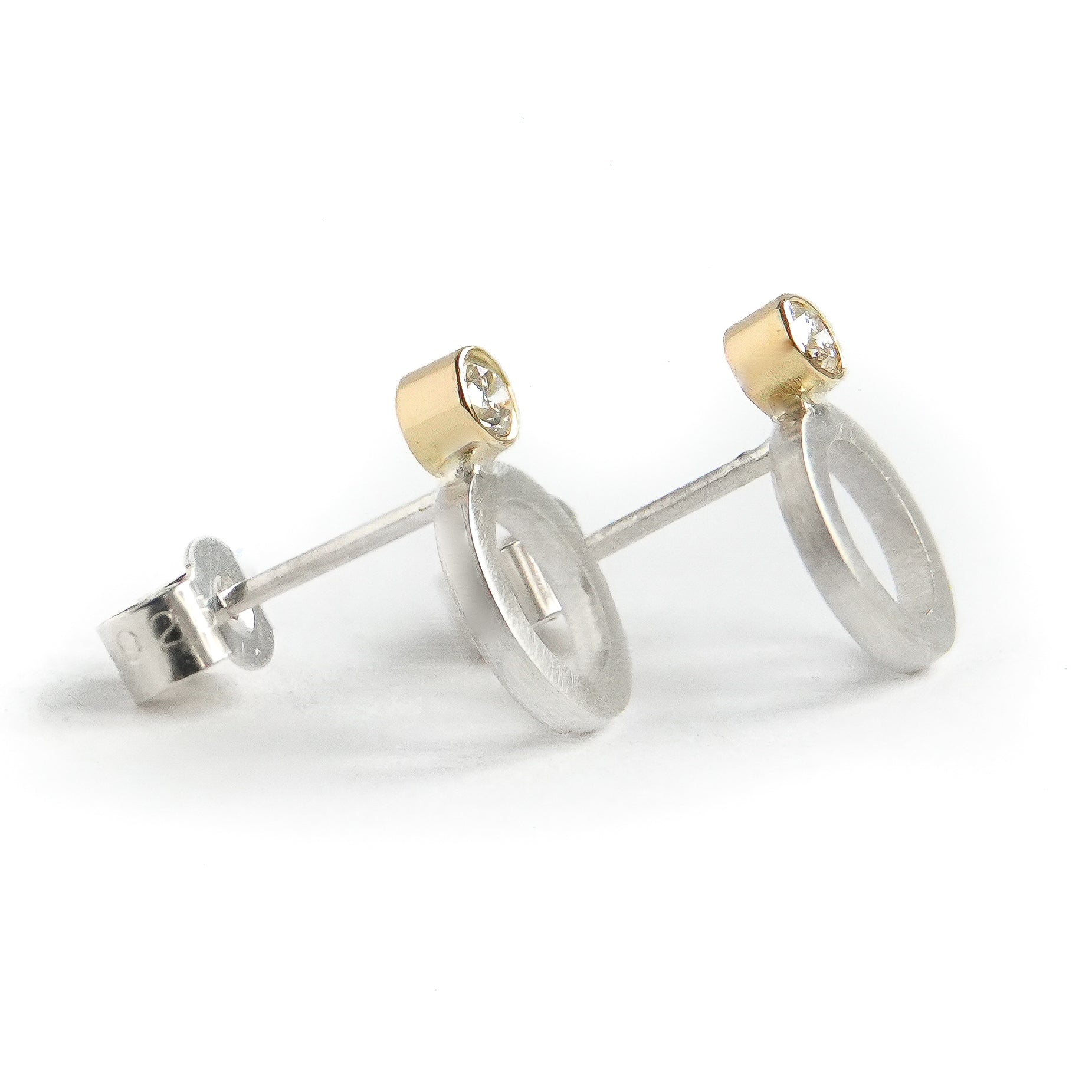 Contemporary, sparkling, silver, yellow gold and diamond stud earrings by Sue Lane