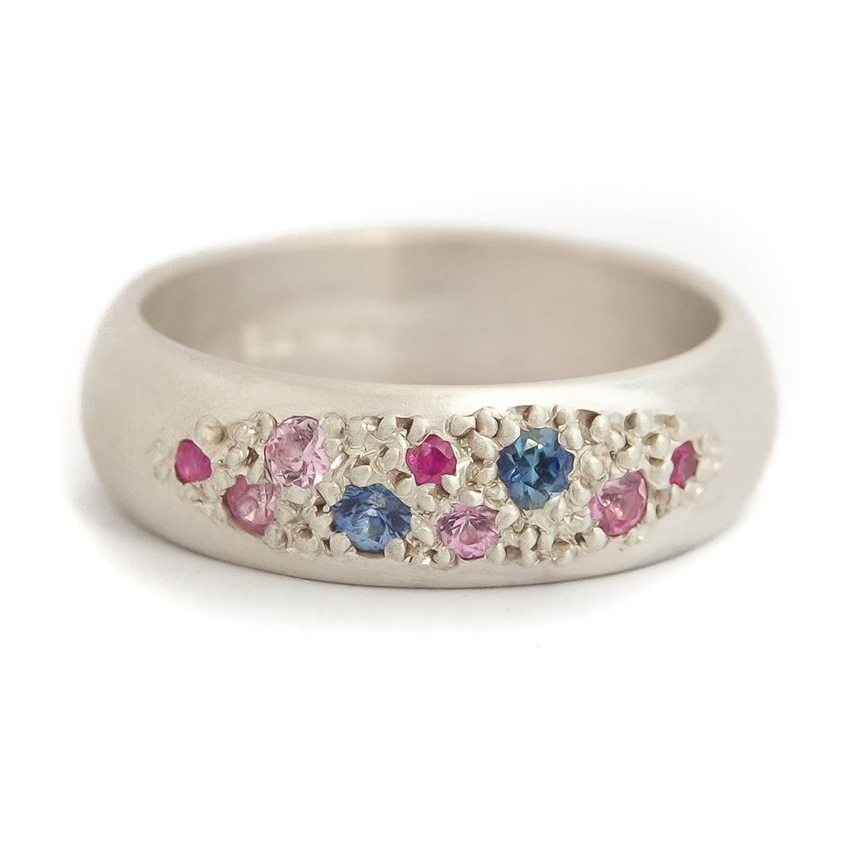 Modern silver dress ring with pink and blue sapphires
