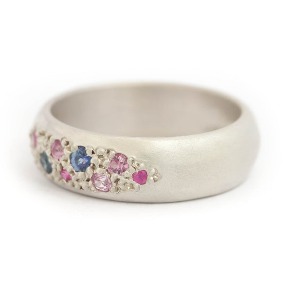 Modern silver dress ring set with pink and blue sapphires, handmade by Sue Lane Jewellery in the UK