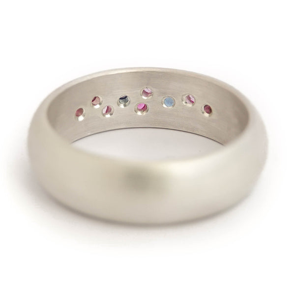 Modern silver dress ring set with pink and blue sapphires, handmade by Sue Lane Jewellery in the UK