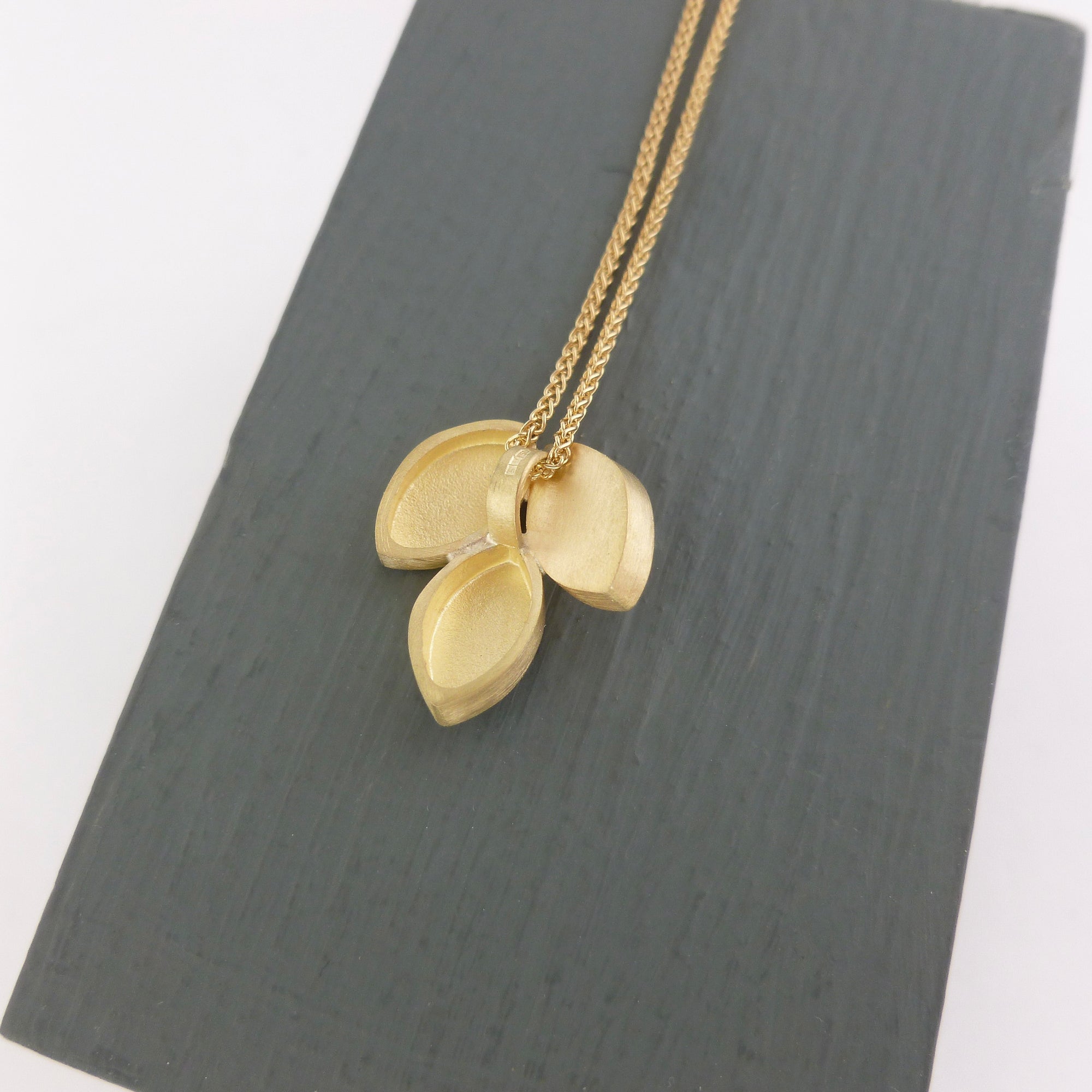 Modern and simple yellow gold leaf contemporary necklace handmade by Sue Lane UK