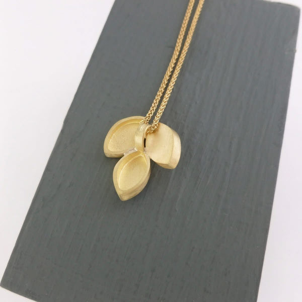 Modern and simple yellow gold leaf contemporary necklace handmade by Sue Lane UK