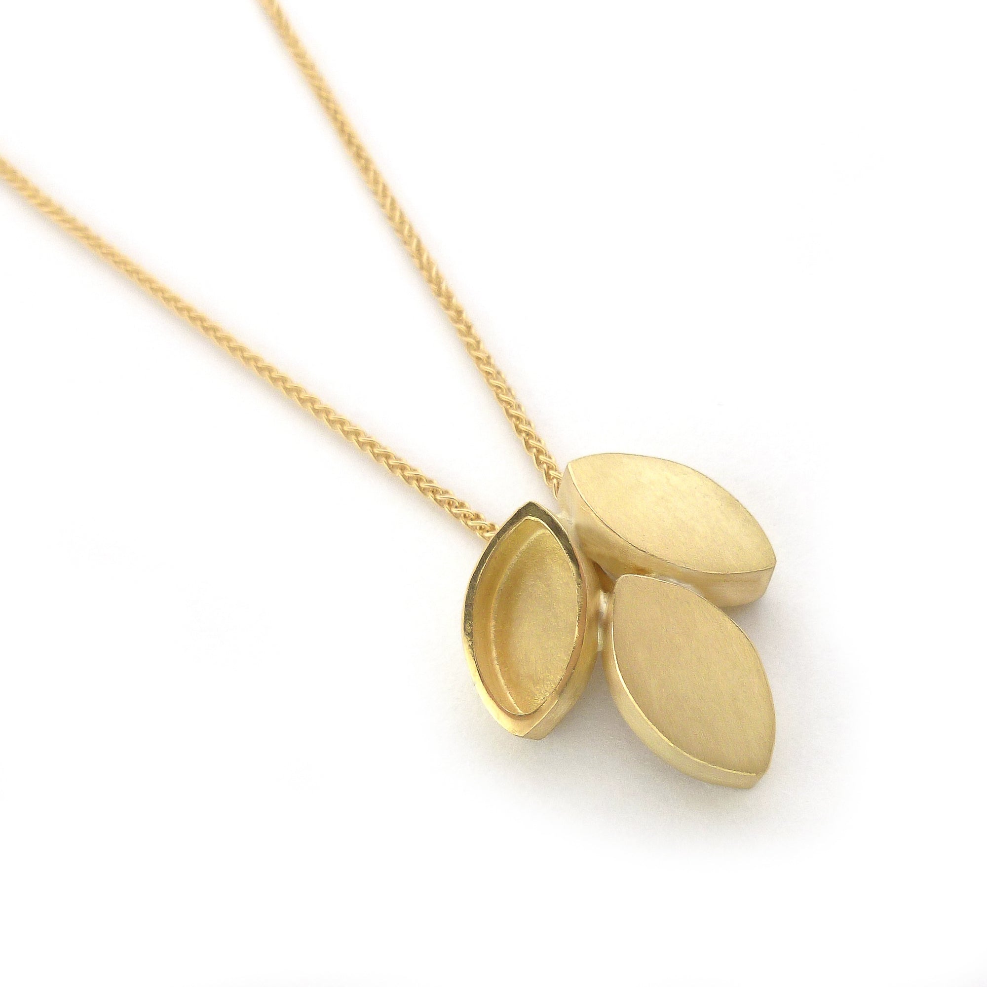 Modern and simple yellow gold leaf contemporary necklace handmade by Sue Lane UK