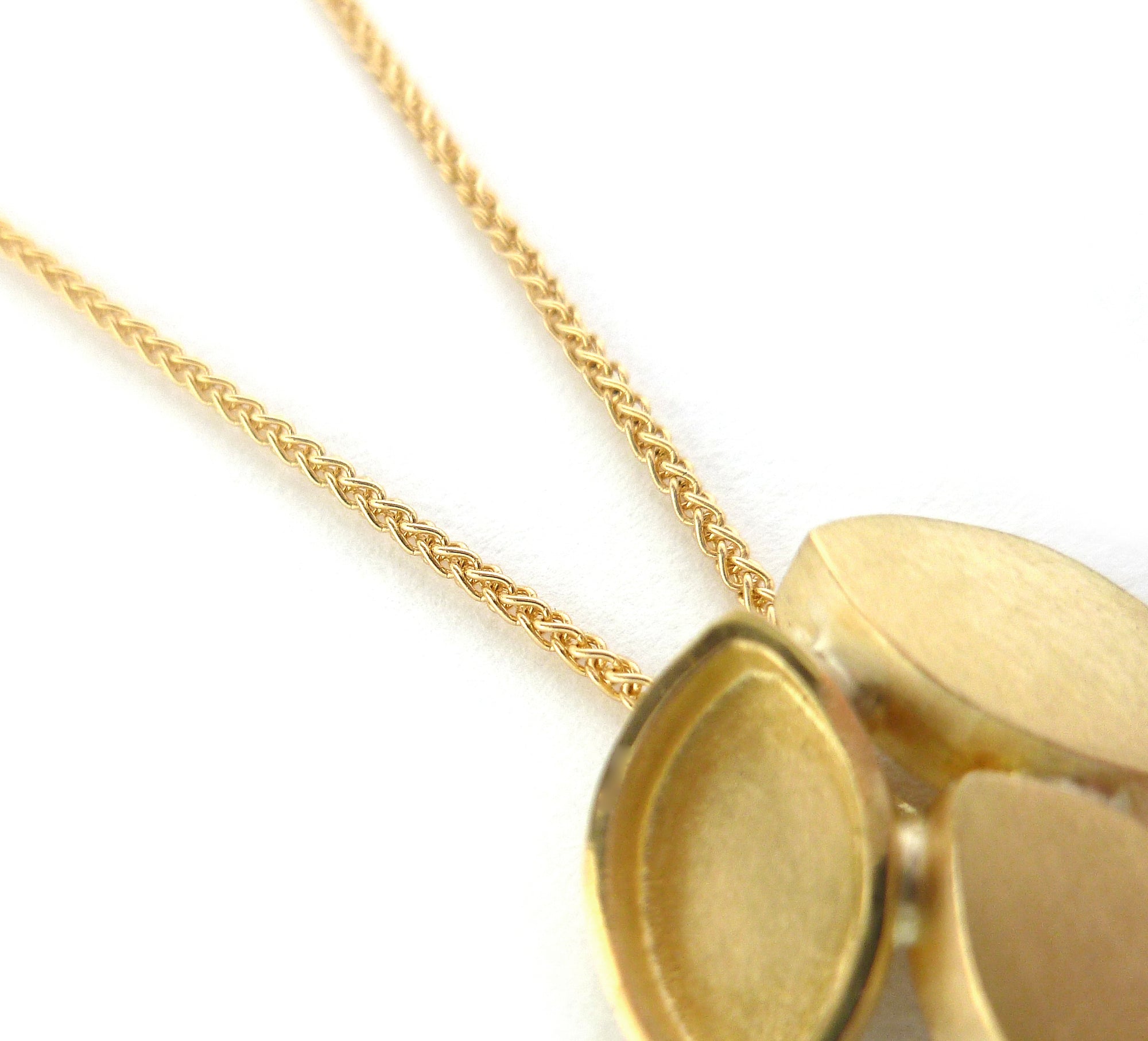 Modern and simple yellow gold leaf contemporary necklace handmade by Sue Lane UK