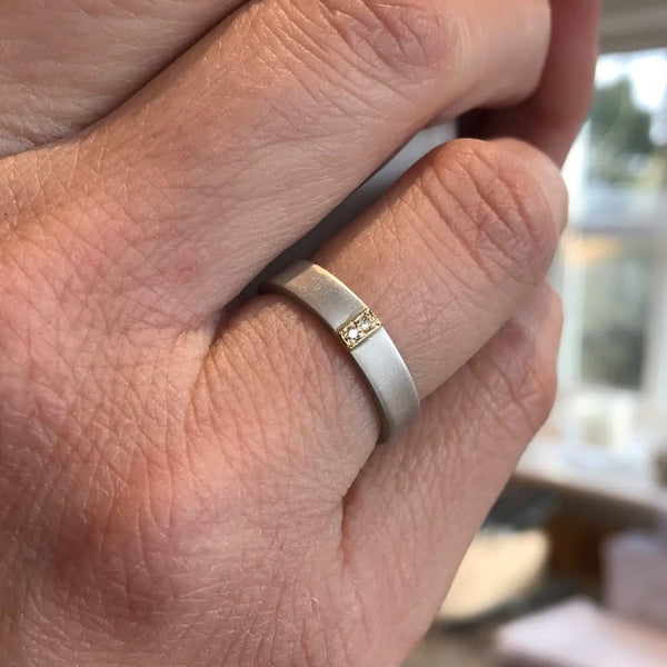Modern handmade 2 diamond wedding ring two tone in platinum and gold with a brushed or polished finish. 