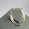 Unusual, unique, bespoke and modern silver "Russian Wedding ring" playful and tactile with brushed finish. Handmade by Sue Lane Contemporary Jewellery UK. 