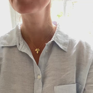 Modern and simple yellow gold leaf contemporary necklace handmade by Sue Lane UK