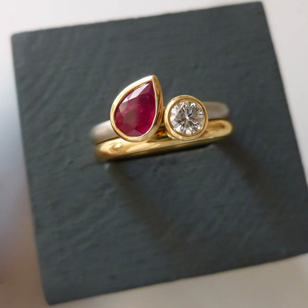 Bespoke 18ct yellow gold and platinum ruby and diamond stacking rings set.